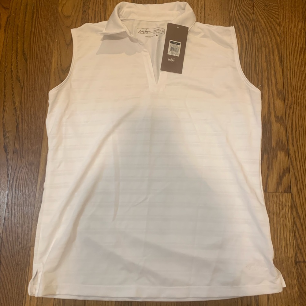 Look cute on the golf course with the NWT Lady Hagen hydro dry sleeveless top.